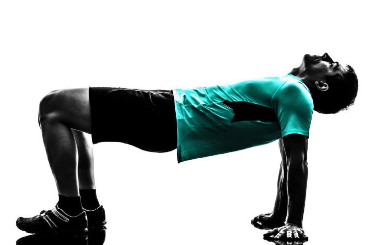 man exercising plank position fitness workout silhouette